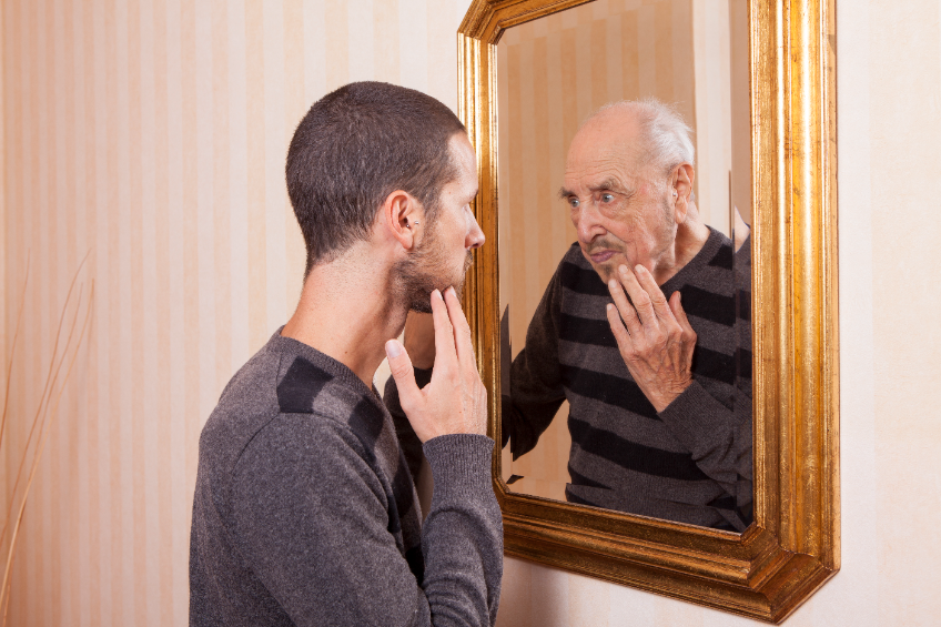 old person in mirror